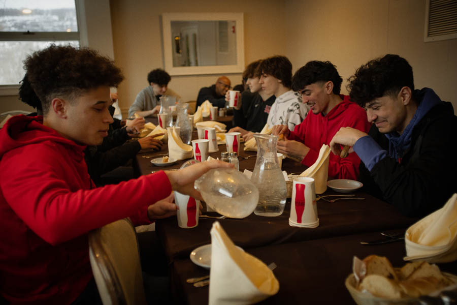 Image of North Rockland High School students enjoying a dinner at Lynch's on the Green, before their victory the next day.