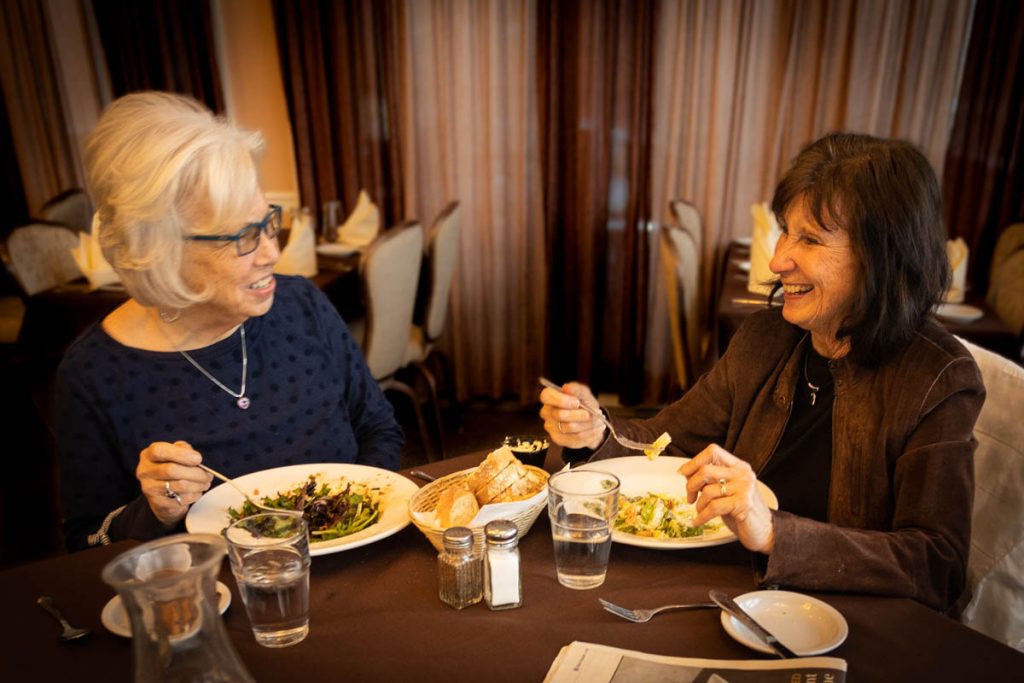 Image of two women enjoying a lunch at Lynch's on the Green